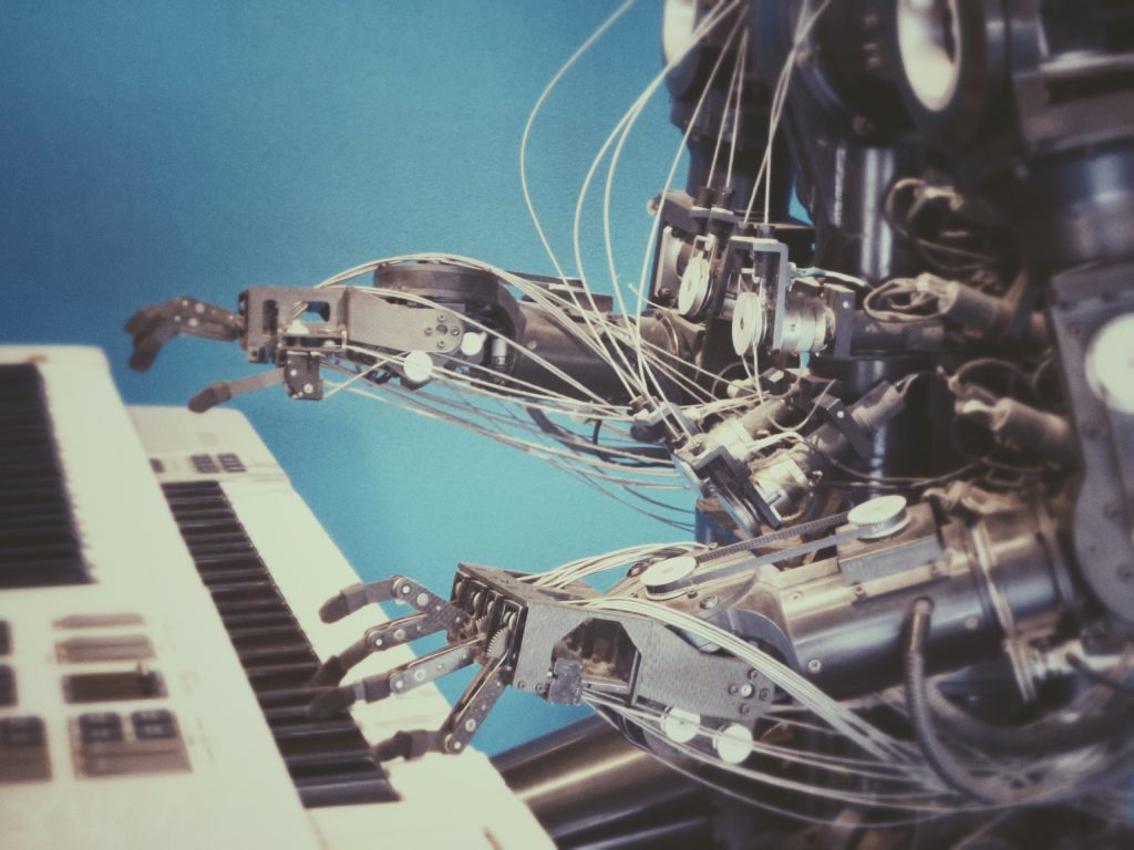 Robotic device playing piano